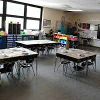 Classroom with several desks and chairs